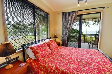 Queen bedroom with views of the sea