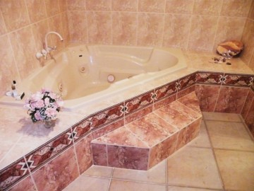 Jacuzzi in master suite for extra indulgence